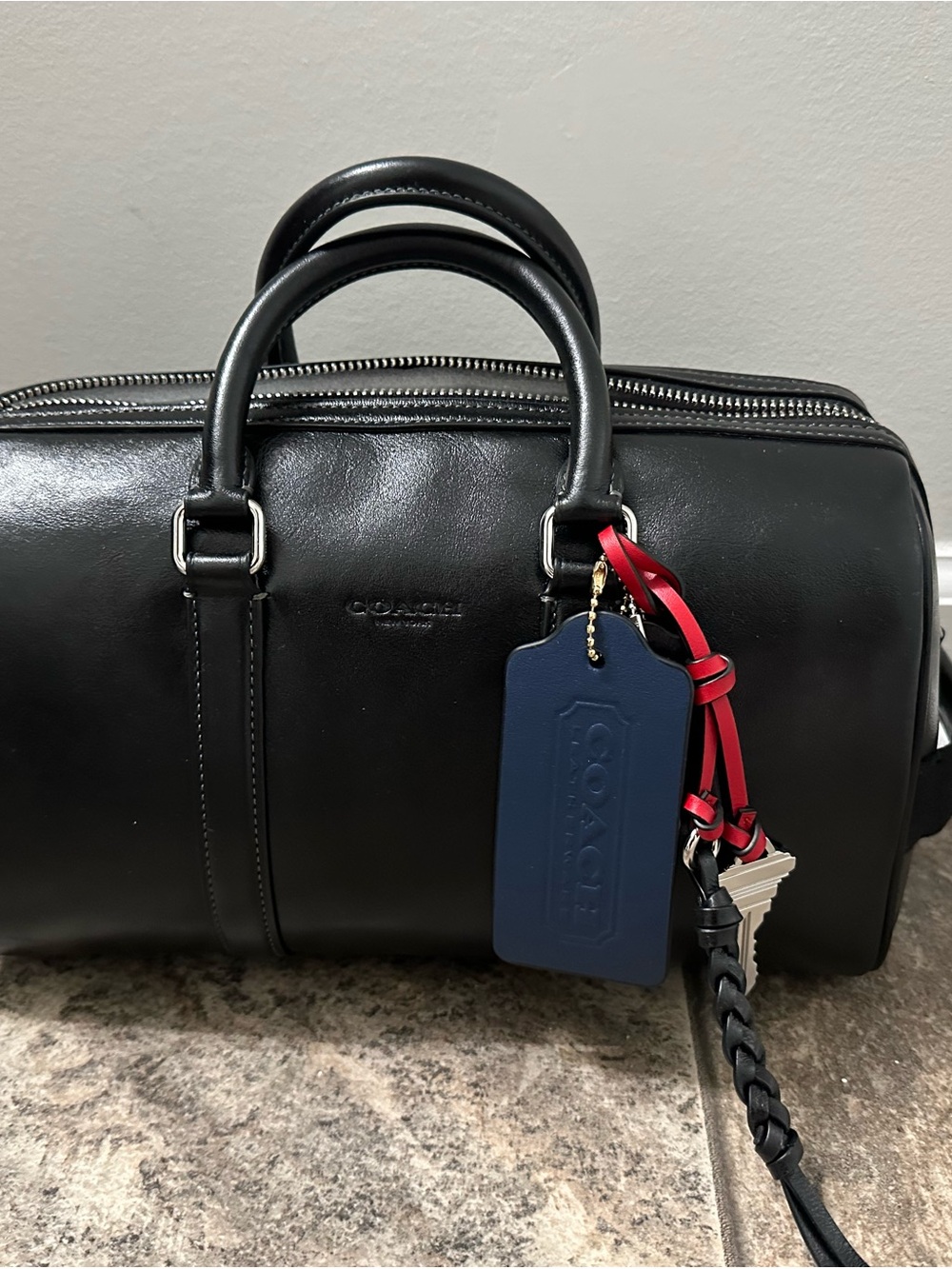 NWT Coach Venturer Black Duffel Bag 27 with bag charms